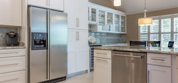 remodeled kitchen with Shaker cabinets and custom storage areas