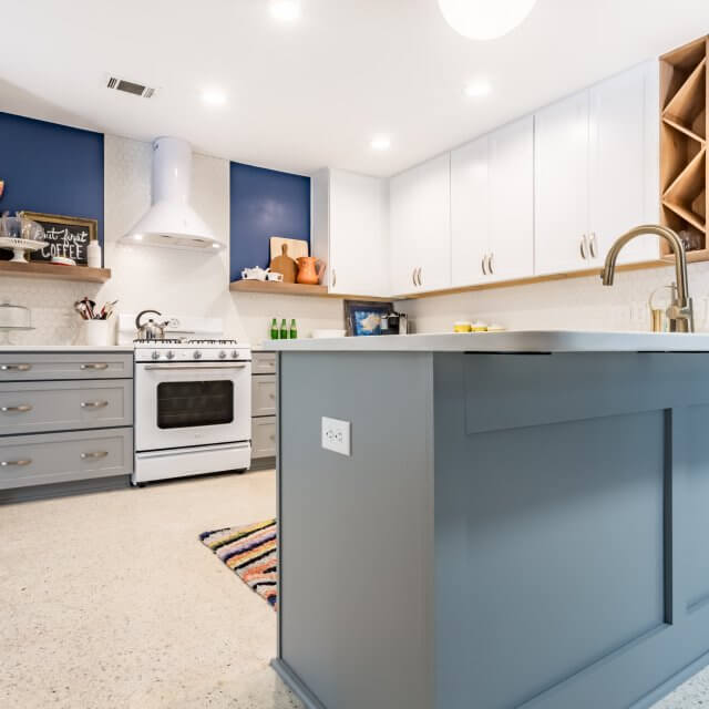 After: Mid-century modern kitchen remodel with island for eating and storage
