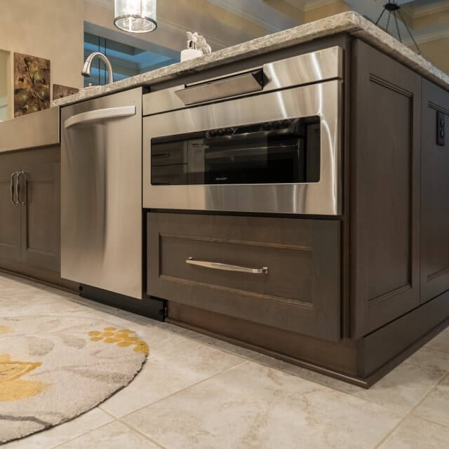 Modern stainless appliances and new Dura Supreme cabinets