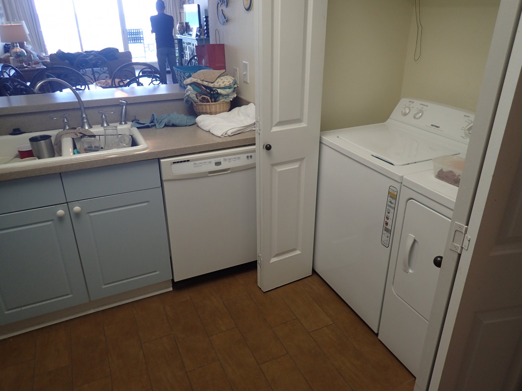 Laundry area before condo kitchen remodel