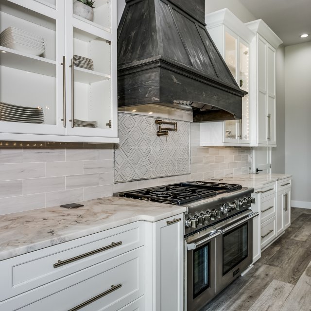 Dramatic tall cabinets in custom new construction kitchen